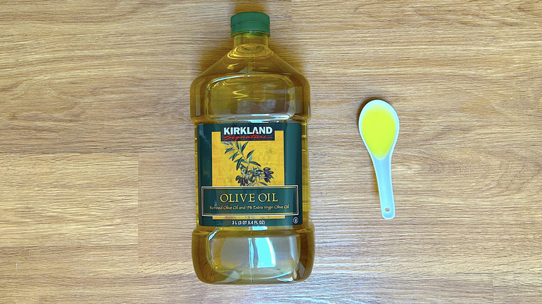 Kirkland Signature Pure Olive Oil bottle.