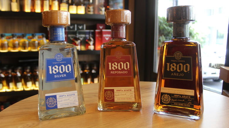 Three bottles of 1800 tequila