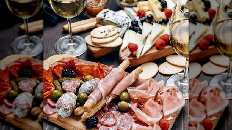 Charcuterie board with meat and berries