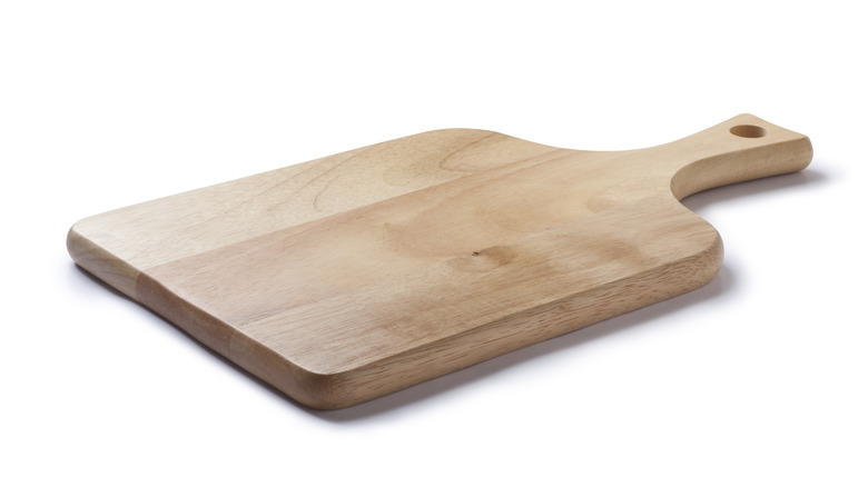 Wooden serving board with blank background