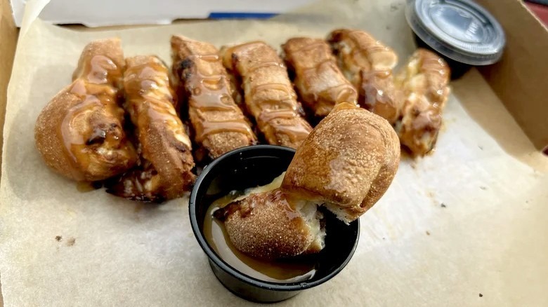  Twix Papa Bites in serving box with dip