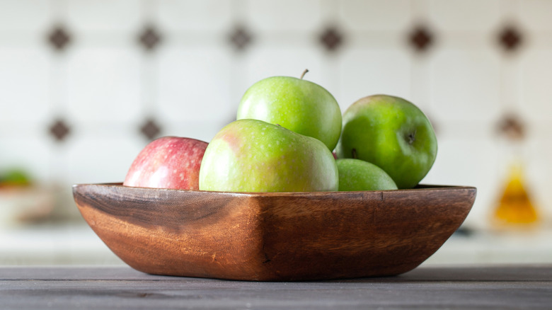 Bowl of apples in kitchen.