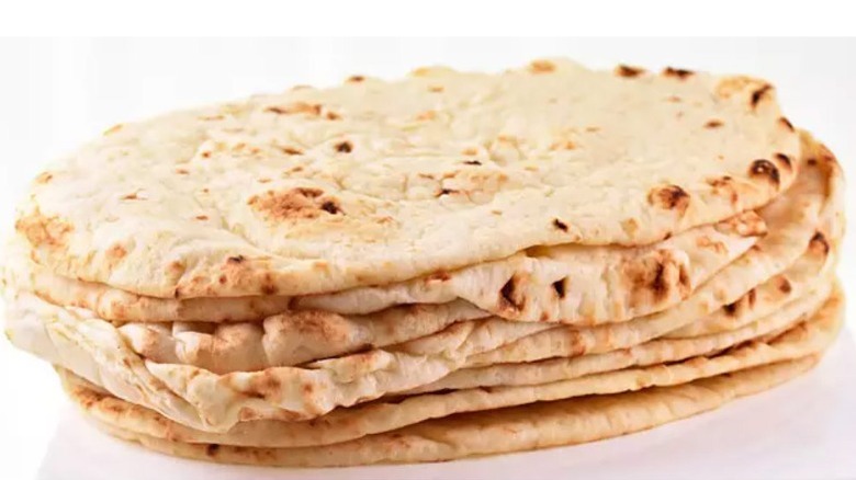 Stack of bubbly naan bread