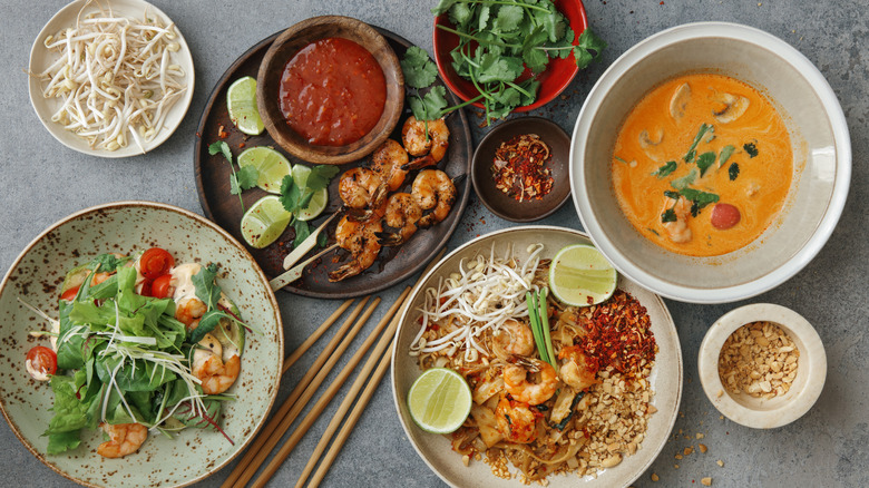 thai dishes spread on table