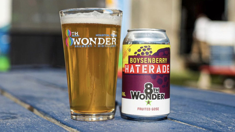 8th Wonder beer glass and can