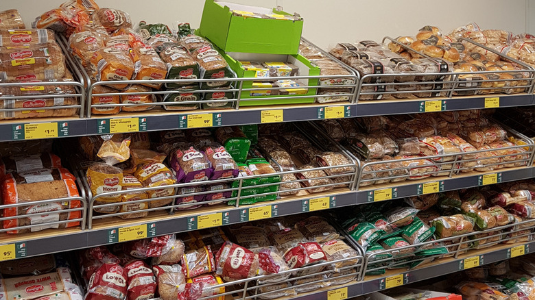 Various packaged bread and bakery goods on an Aldi shelves