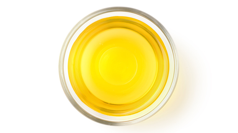 vegetable oil in glass container