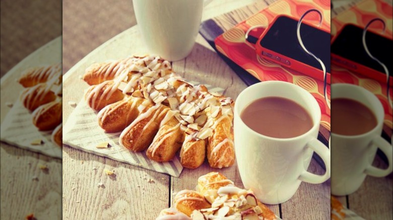 bear claw and coffee cup