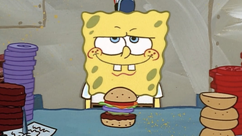 Spongebob assembling a Krabby Patty
