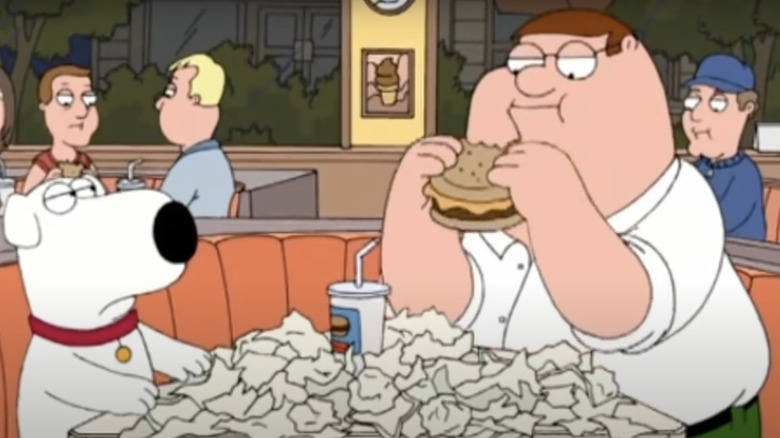 Peter Griffin eating a burger
