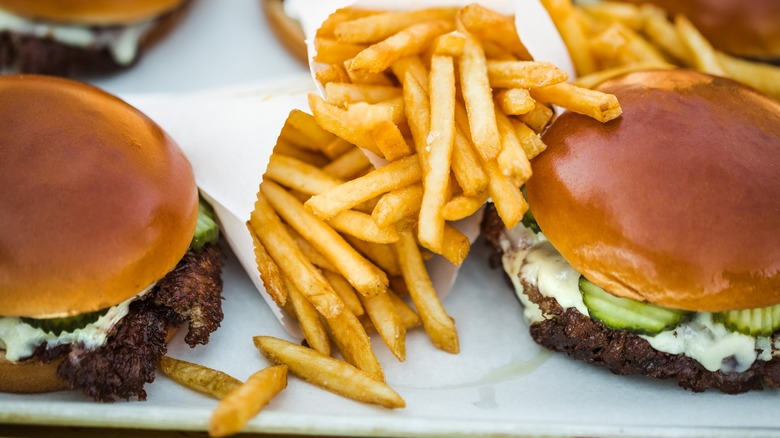 An array of burgers and fries