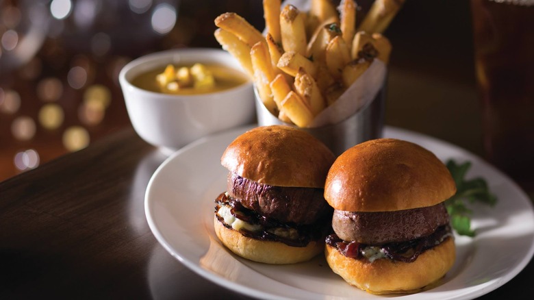 Burger and fries on plate