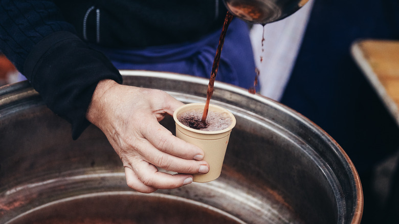 Glühwein being poured into cup