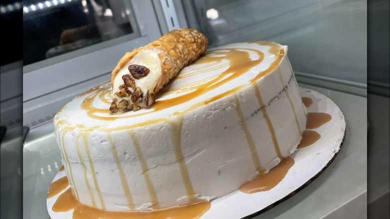 Cannoli cake topped with caramel