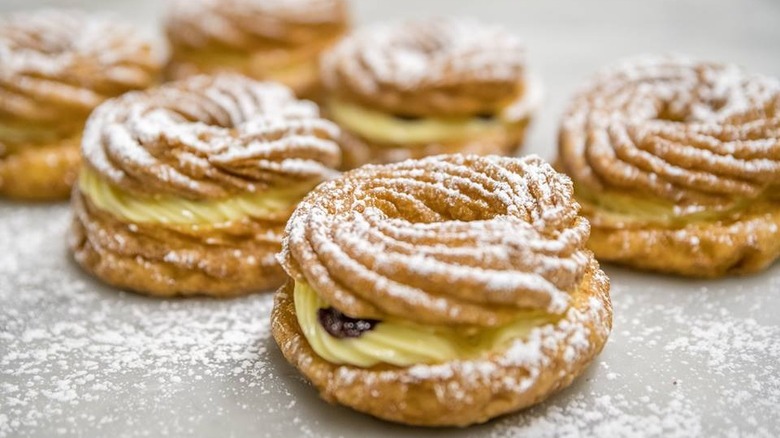 Baked goods dusted with powdered sugar