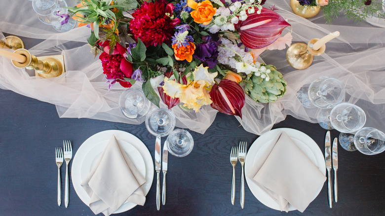 elegant table setting with candles and flowers