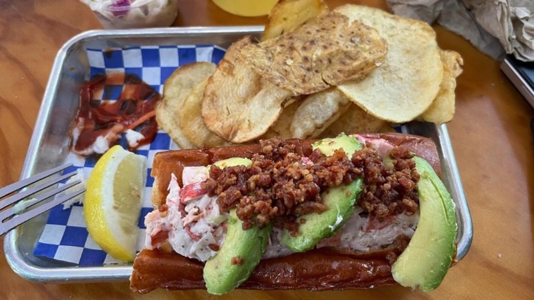 Seasonal lobster roll in serving boat