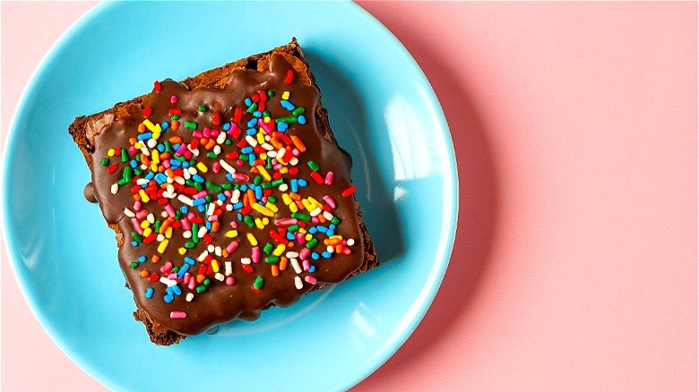Brownie with frosting and sprinkles
