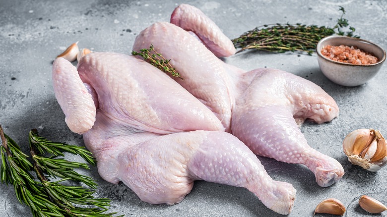 spatchcocked raw chicken