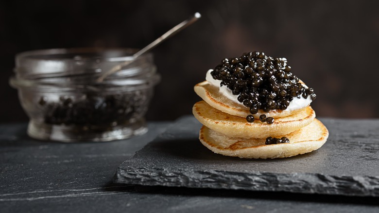 blinis with crème fraîche and caviar