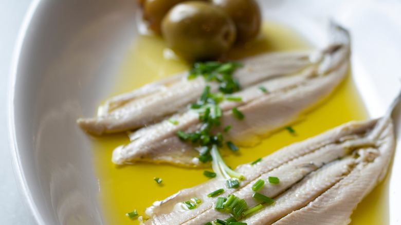 Anchovies in olive oil with chives