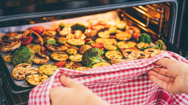 Vegetables entering oven