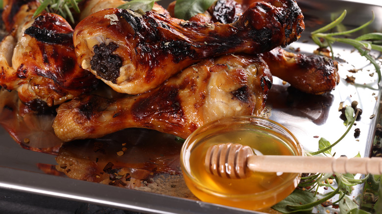 Honey barbecue chicken on pan