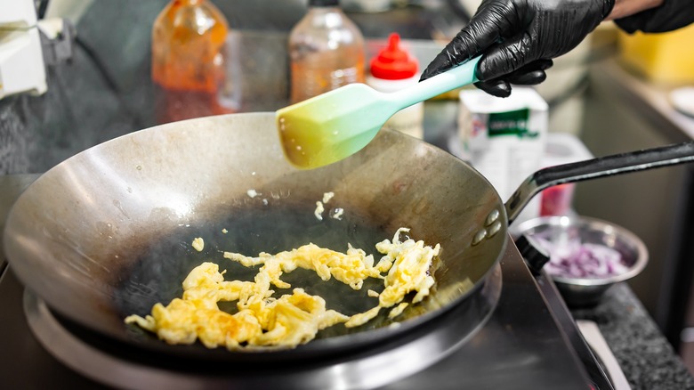 scrambled eggs cooked in hot wok