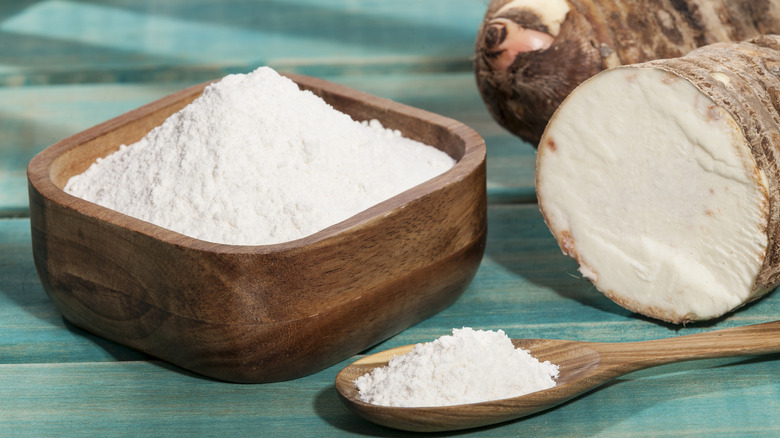 arrowroot flour wooden bowl and spoon