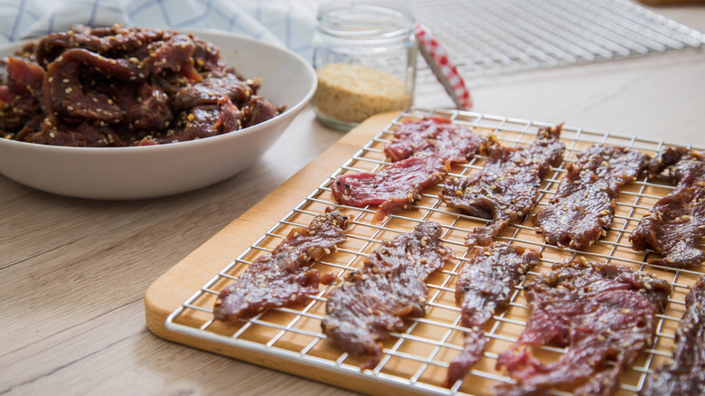 Raw marinated beef strips