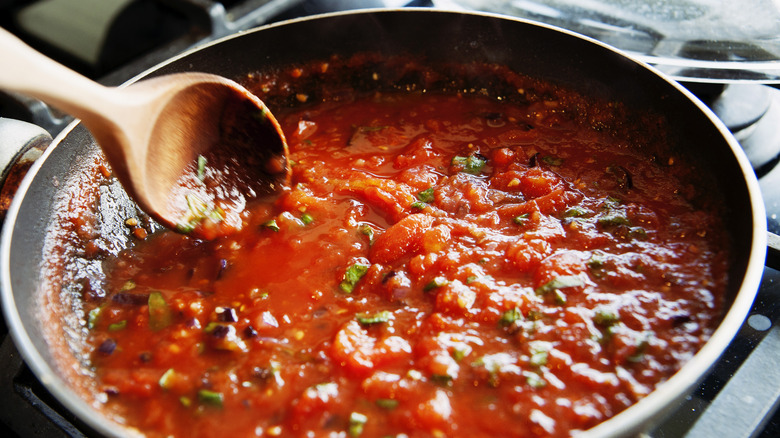 Tomato sauce cooking in pot