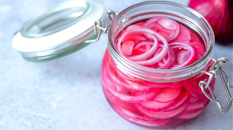 Pickled red onions in jar 