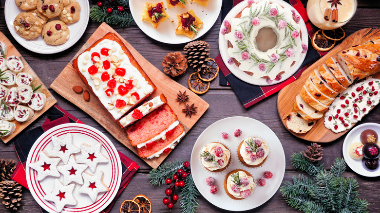 holiday potluck dessert buffet on a festive table