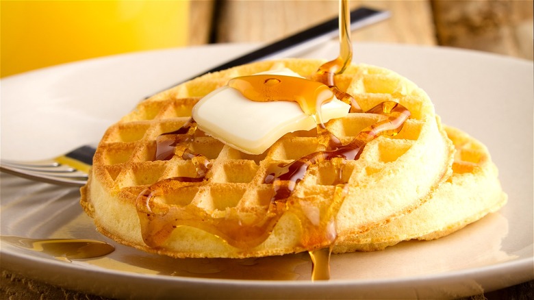 Waffles with butter and maple syrup