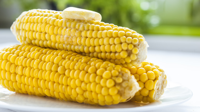 corn cobs with butter pat