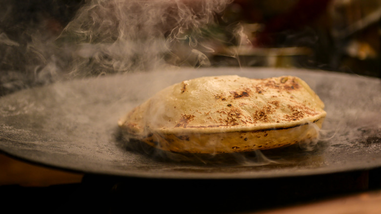 flatbread baking in pan 