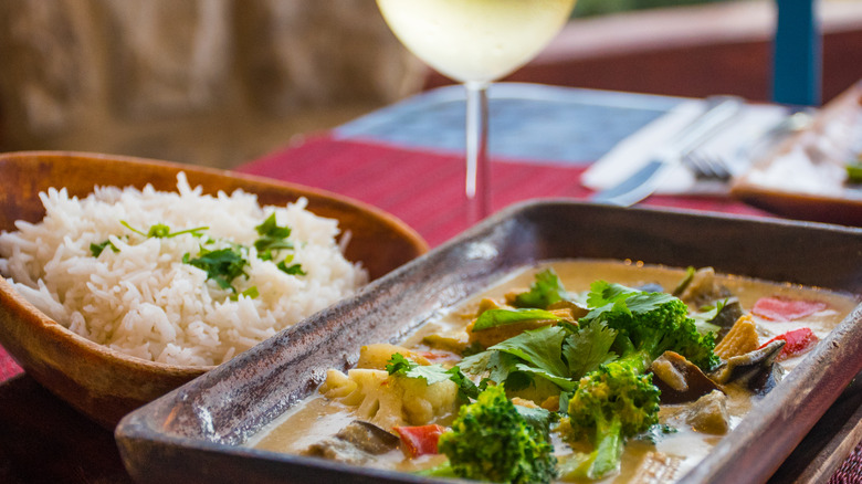 Thai curry with wine glass