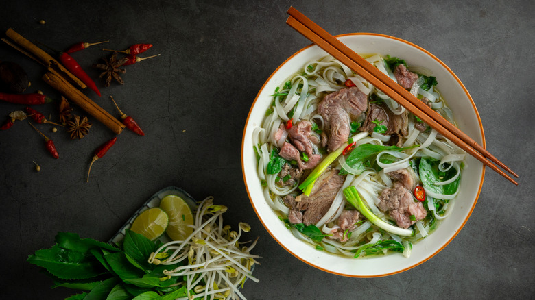 Pho bo with chopsticks