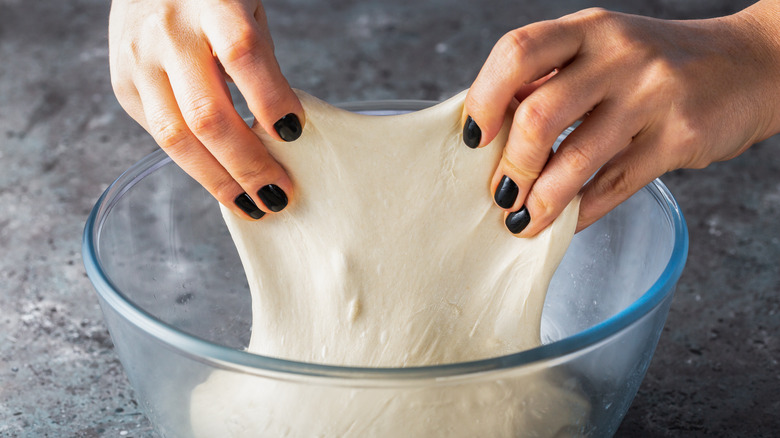 stretching and folding dough