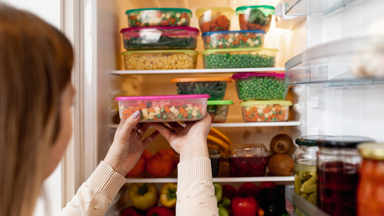 Stacking vegetables in the freezer