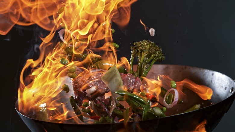 wok stir-fry with flames
