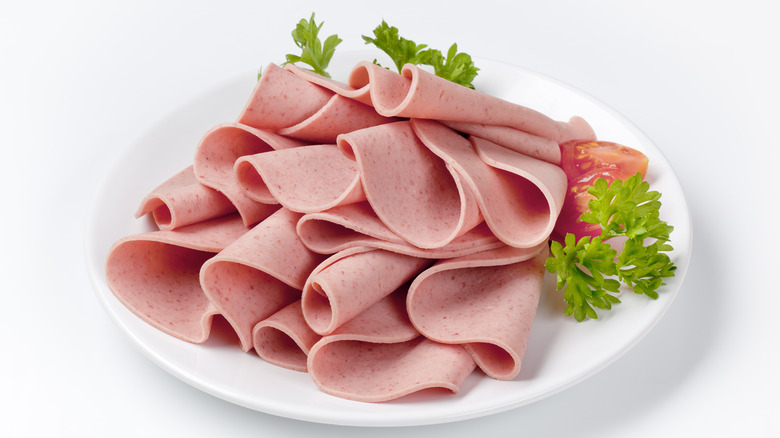 Bologna slices on plate