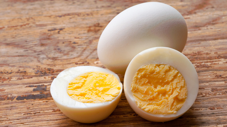 Hard boiled eggs on wood table