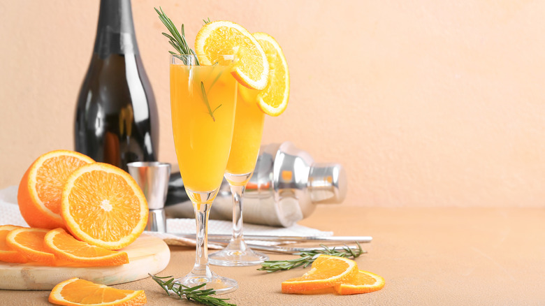 Sparkling wine spritzer with orange and rosemary