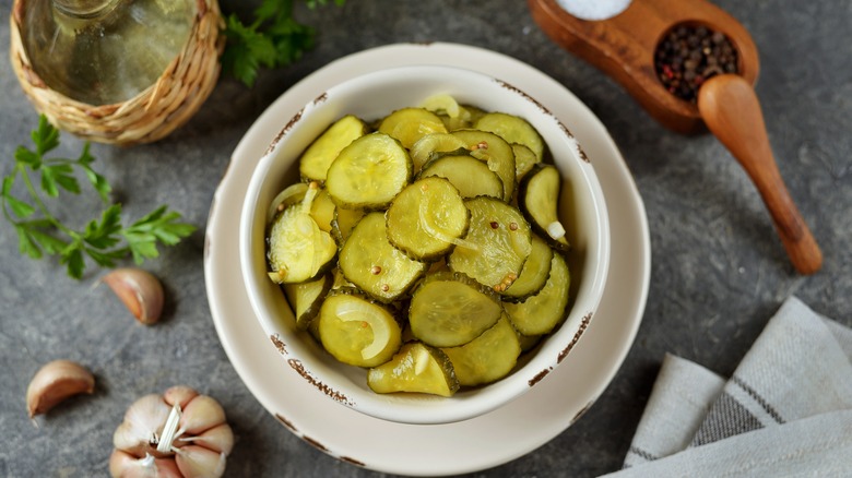 Birdseye of a bowl of pickle slices