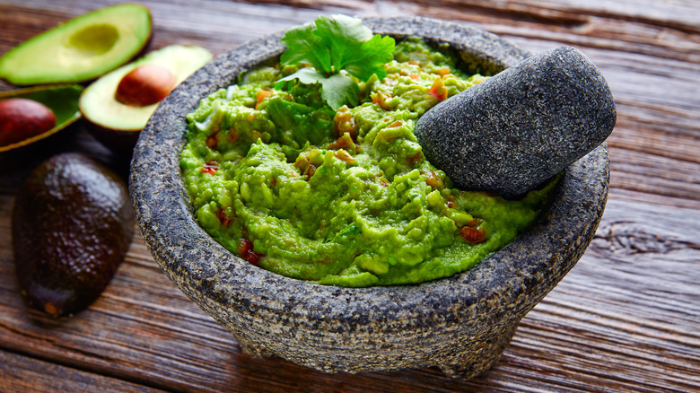 guacamole served in molcajete