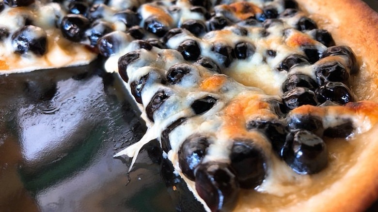 up close view of foodie star's boba pizza