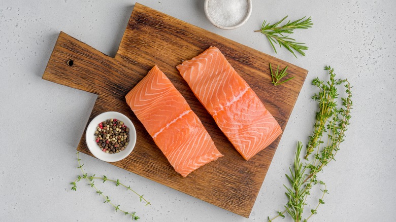 skinless salmon on cutting board