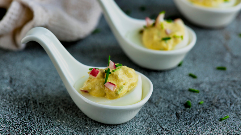 Horseradish deviled eggs in single-serving spoons