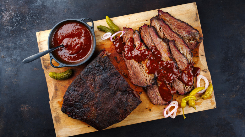 sliced steak with steak sauce poured on top